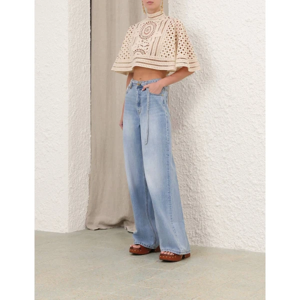 Elevate your elegance in this Zimmermann Tops available now at Coveti