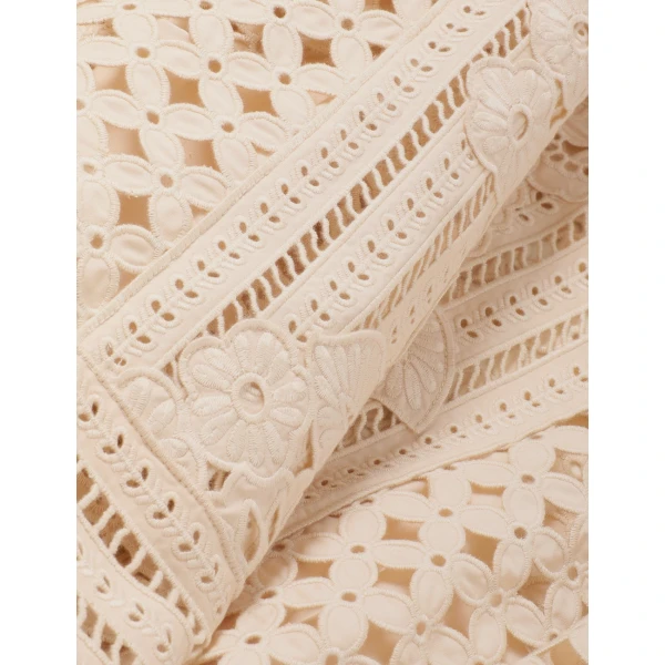 Elevate your elegance in this Zimmermann Tops available now at Coveti
