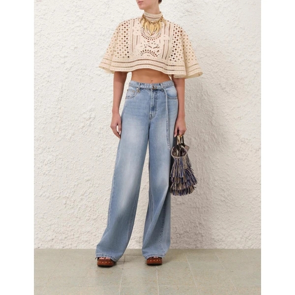Elevate your elegance in this Zimmermann Tops available now at Coveti