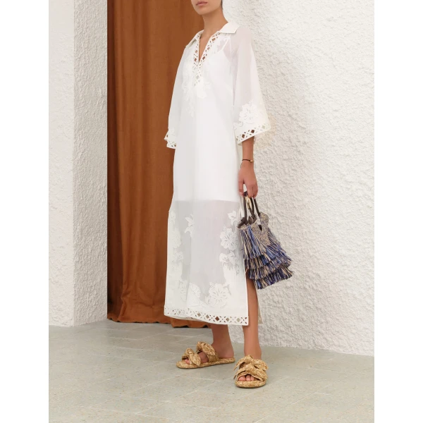 Elevate your elegance in this Zimmermann Dresses available now at Coveti