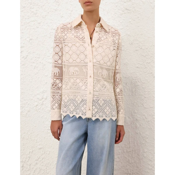 Elevate your elegance in this Zimmermann Tops available now at Coveti