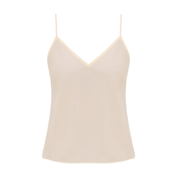 Elevate your elegance in this Zimmermann Tops available now at Coveti