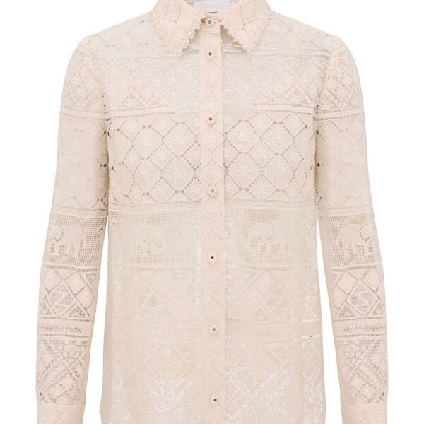 Elevate your elegance in this Zimmermann Tops available now at Coveti