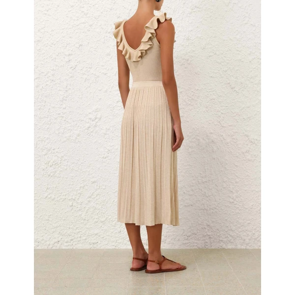 Elevate your elegance in this Zimmermann Tops available now at Coveti