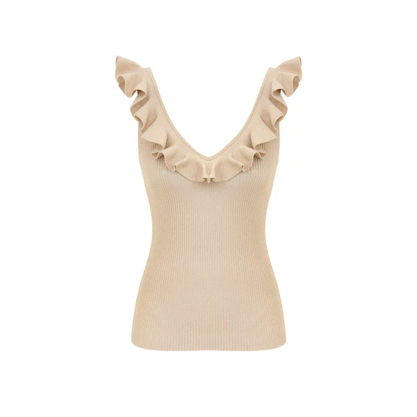 Elevate your elegance in this Zimmermann Tops available now at Coveti