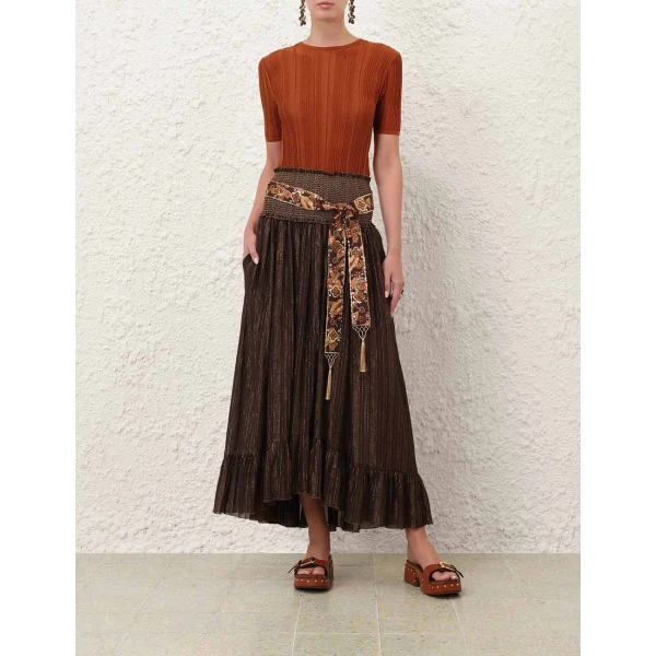Elevate your elegance in this Zimmermann Tops available now at Coveti