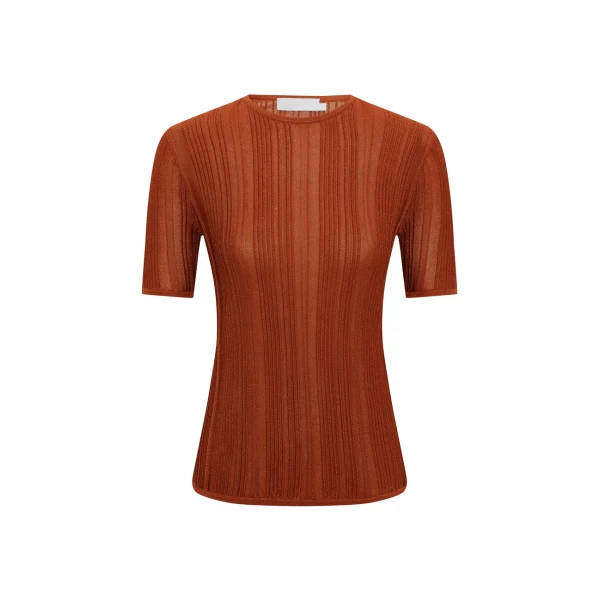 Elevate your elegance in this Zimmermann Tops available now at Coveti