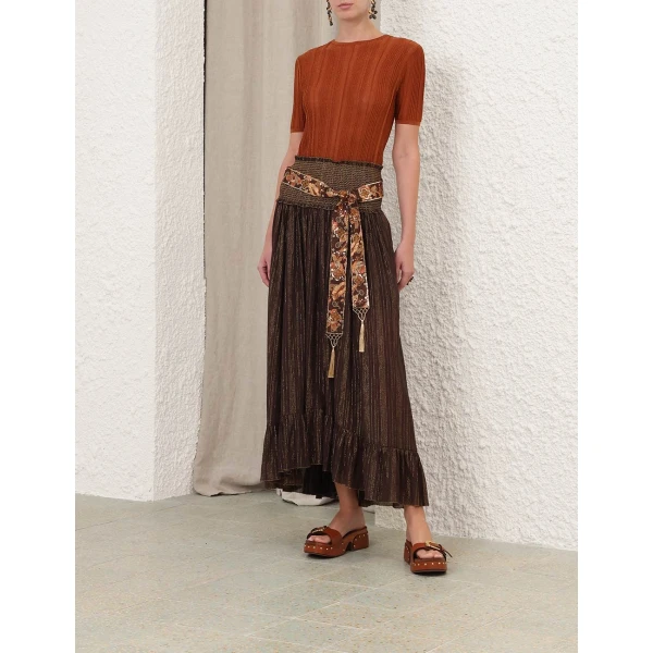 Elevate your elegance in this Zimmermann Tops available now at Coveti