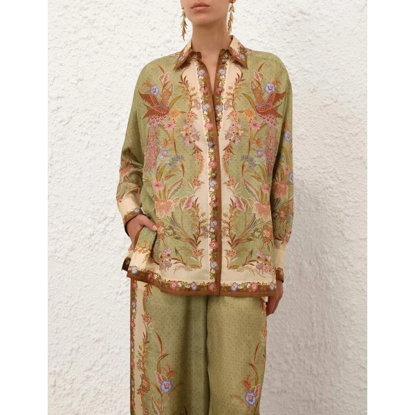 Elevate your elegance in this Zimmermann Tops available now at Coveti