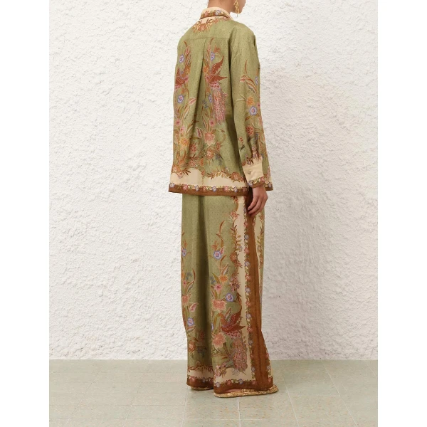 Elevate your elegance in this Zimmermann Tops available now at Coveti