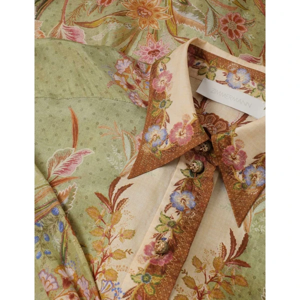 Elevate your elegance in this Zimmermann Tops available now at Coveti