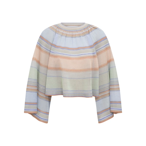 Elevate your elegance in this Zimmermann Tops available now at Coveti