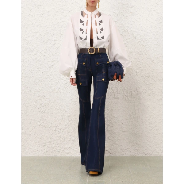Elevate your elegance in this Zimmermann Tops available now at Coveti