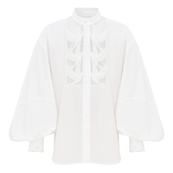 Elevate your elegance in this Zimmermann Tops available now at Coveti