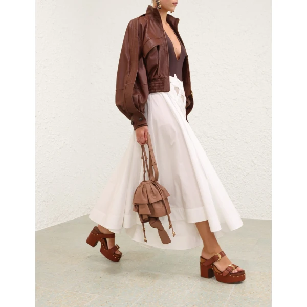 Elevate your elegance in this Zimmermann Skirts available now at Coveti