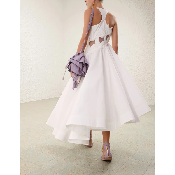 Elevate your elegance in this Zimmermann Dresses available now at Coveti