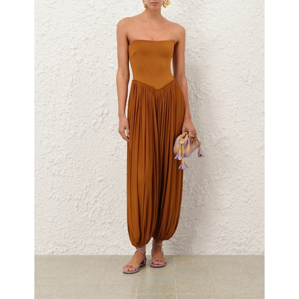 Elevate your elegance in this Zimmermann Jumpsuit available now at Coveti