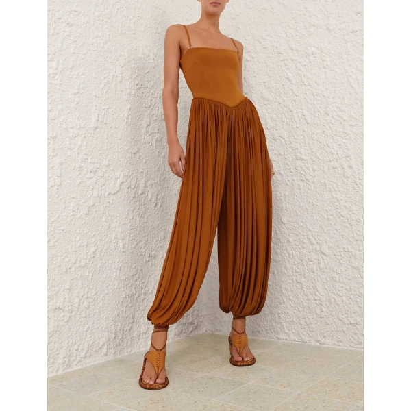 Elevate your elegance in this Zimmermann Jumpsuit available now at Coveti