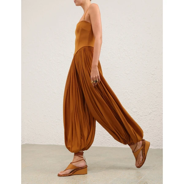 Elevate your elegance in this Zimmermann Jumpsuit available now at Coveti