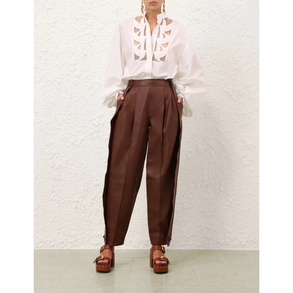 Elevate your elegance in this Zimmermann Pants available now at Coveti