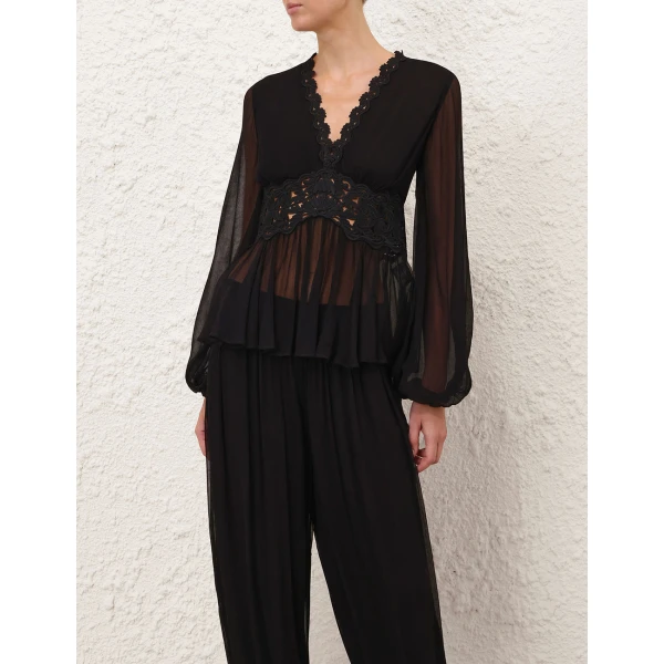 Elevate your elegance in this Zimmermann Tops available now at Coveti