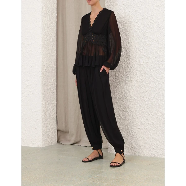 Elevate your elegance in this Zimmermann Tops available now at Coveti
