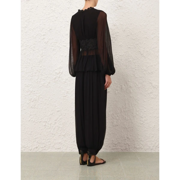 Elevate your elegance in this Zimmermann Tops available now at Coveti