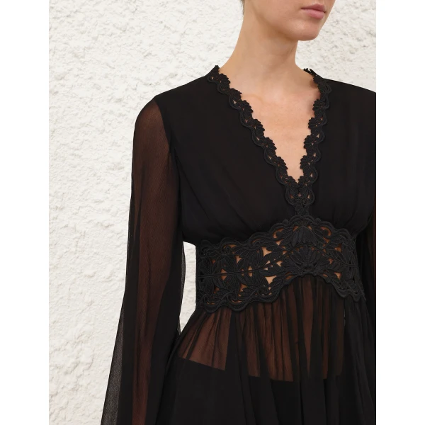 Elevate your elegance in this Zimmermann Tops available now at Coveti