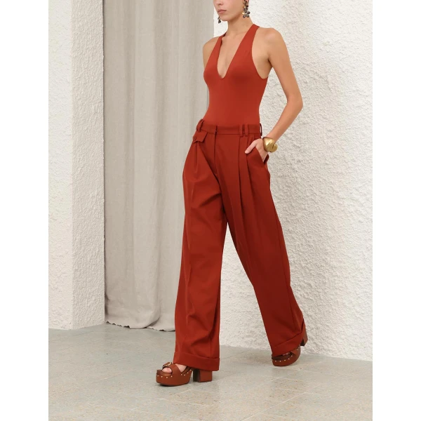Elevate your elegance in this Zimmermann Bodysuit available now at Coveti