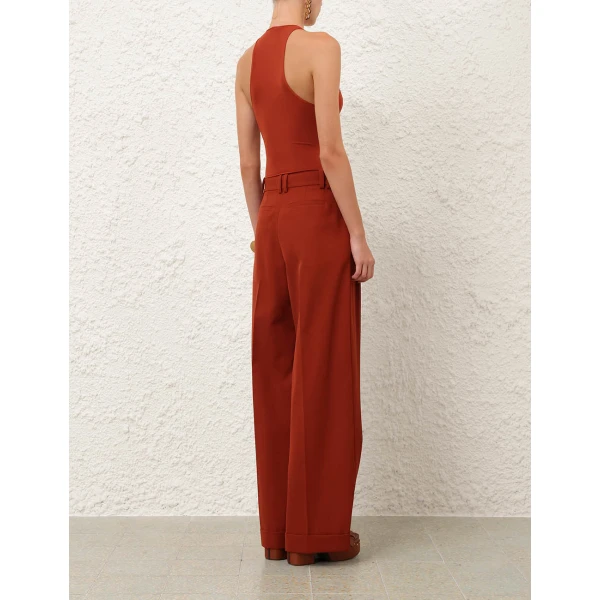 Elevate your elegance in this Zimmermann Bodysuit available now at Coveti