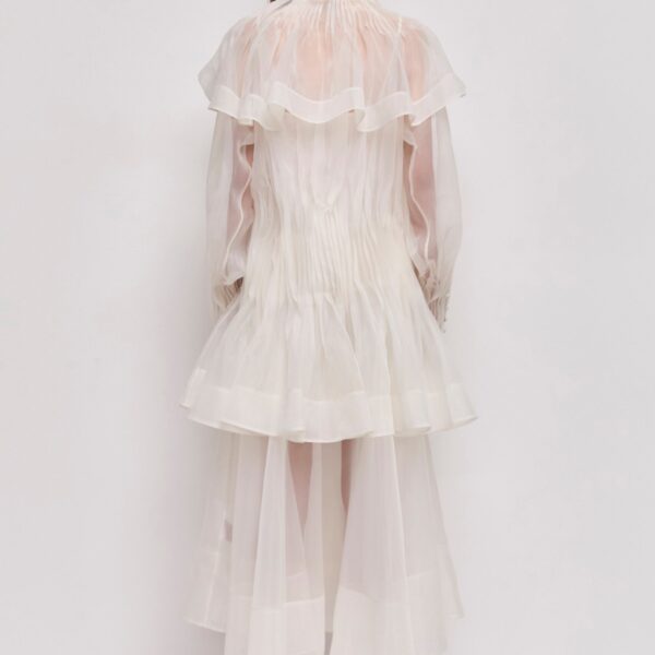 Aje clothing Aus Coats – structured silhouette with raw femininity from Coveti