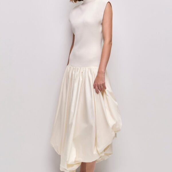Aje Aus Dresses – structured silhouette with raw femininity from Coveti