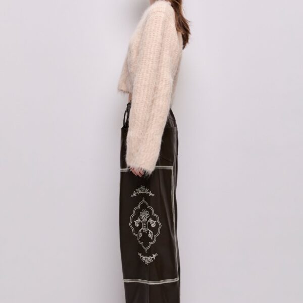 Aje Aus Knitwear – structured silhouette with raw femininity from Coveti