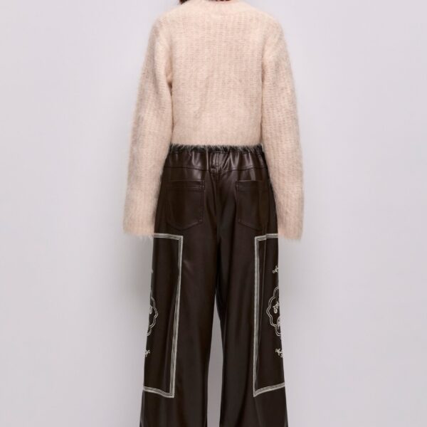 Aje clothing Aus Knitwear – structured silhouette with raw femininity from Coveti