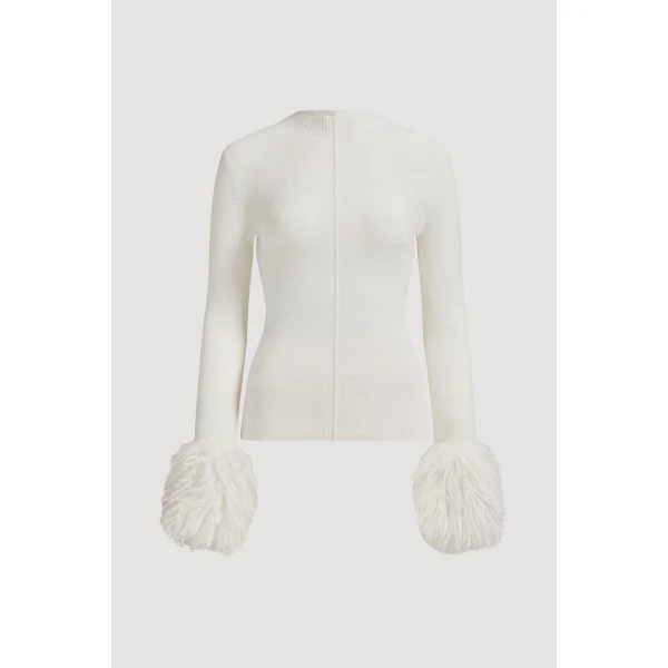Aje clothing Aus Knitwear – structured silhouette with raw femininity from Coveti