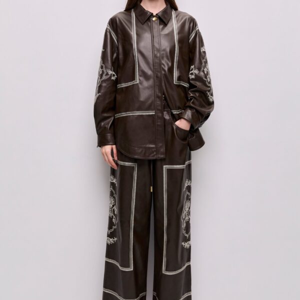 Aje clothing Aus Pants – structured silhouette with raw femininity from Coveti