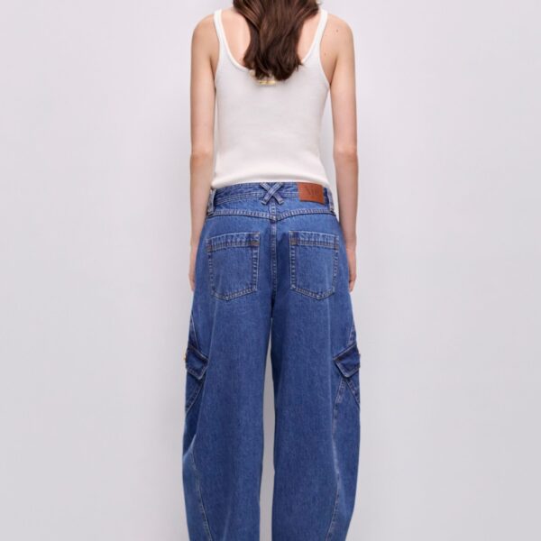 Aje clothing Aus Pants – structured silhouette with raw femininity from Coveti