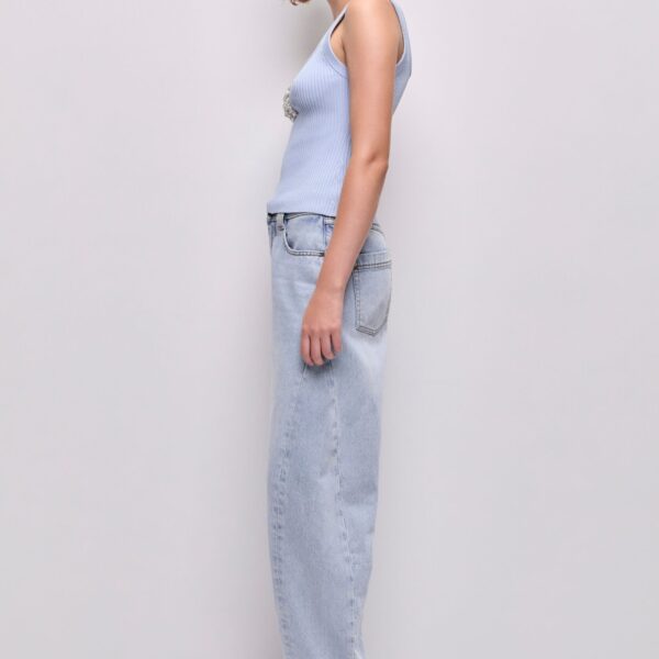 Aje Aus Tops – structured silhouette with raw femininity from Coveti