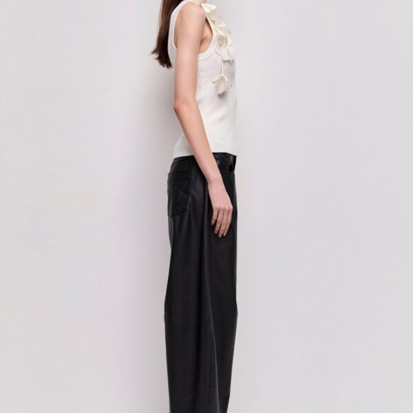 Aje Aus Tops – structured silhouette with raw femininity from Coveti