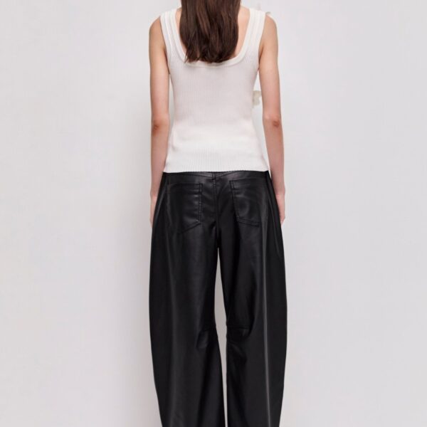 Aje clothing Aus Tops – structured silhouette with raw femininity from Coveti