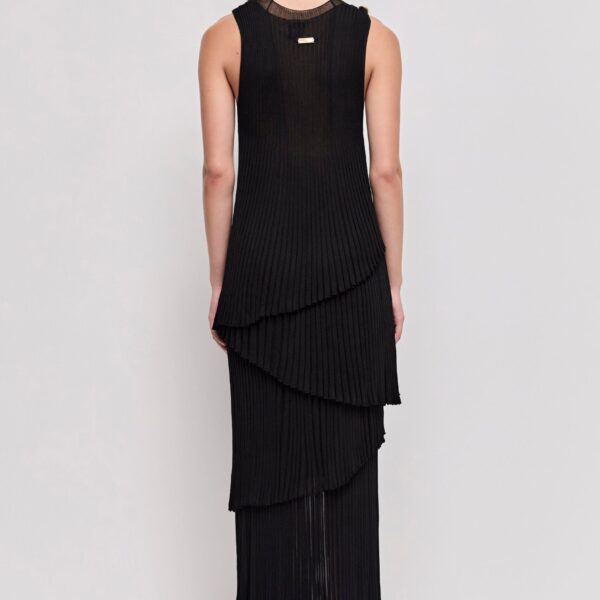 Aje Aus Tops – structured silhouette with raw femininity from Coveti