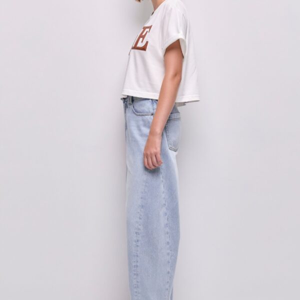 Aje Aus Tops – structured silhouette with raw femininity from Coveti