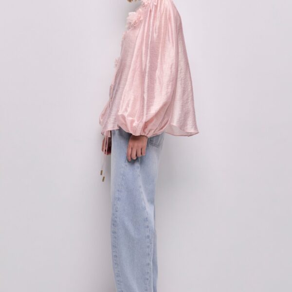 Aje Aus Tops – structured silhouette with raw femininity from Coveti