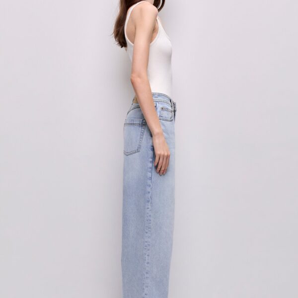 Aje Aus Tops – structured silhouette with raw femininity from Coveti