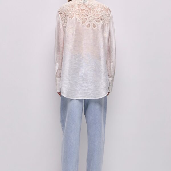 Aje clothing Aus Tops – structured silhouette with raw femininity from Coveti