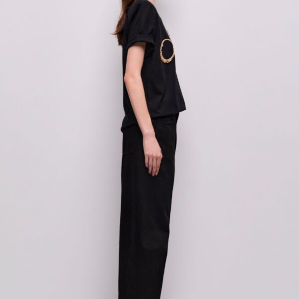 Aje Aus Tops – structured silhouette with raw femininity from Coveti