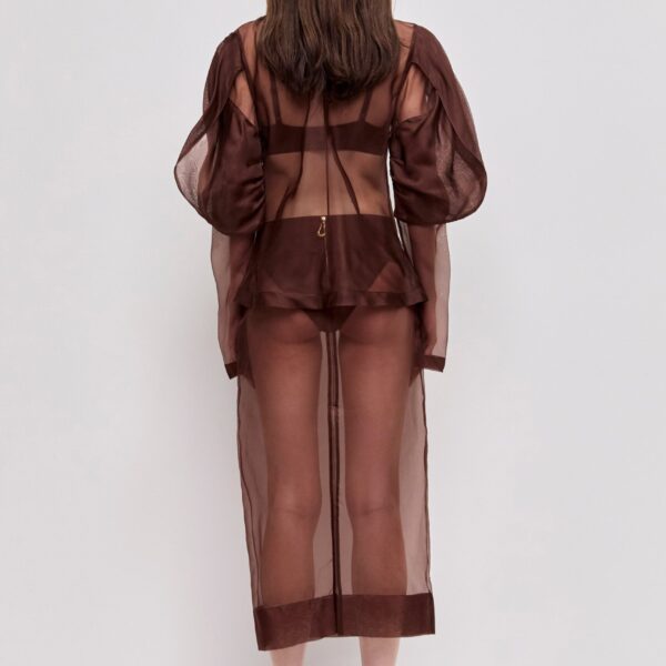 Aje Aus Tops – structured silhouette with raw femininity from Coveti