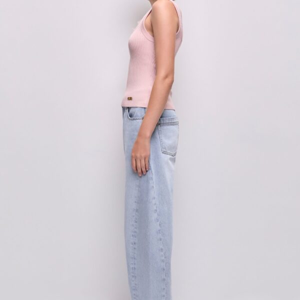 Aje Aus Tops – structured silhouette with raw femininity from Coveti