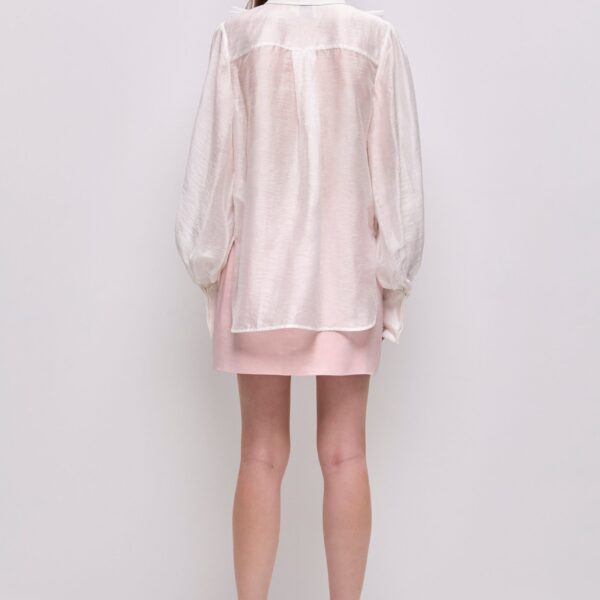 Aje clothing Aus Tops – structured silhouette with raw femininity from Coveti