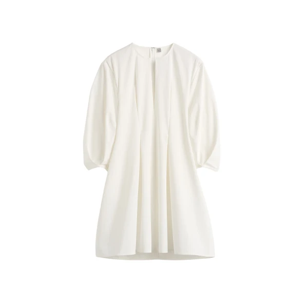 Toteme Dresses with minimalist design at Coveti